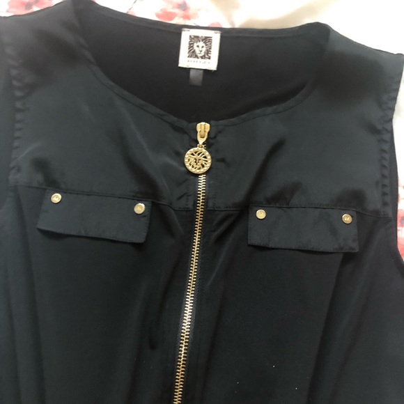 Black romper with gold detailing on the zipper and strings - Picture 3 of 3